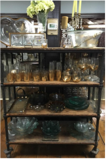 Assortment of china on various shelves.